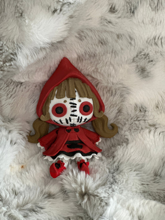 Red Creepy Doll